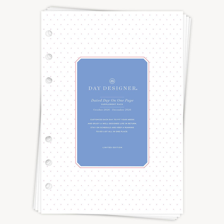 White planner cover with blue label featuring 'Day Designer' text on a white background