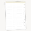 White notebook with ruled pages on a white background