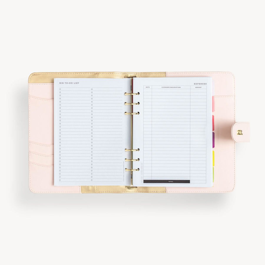 Open blush A5 vegan leather planner with, gold lining and big to do pages, and a gold clasp on the front cover.